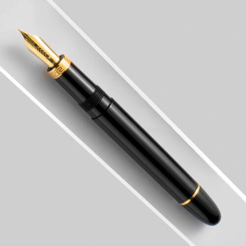 omas-ogiva-nera-gold-trim-fountain-pen-uncapped-nibsmith